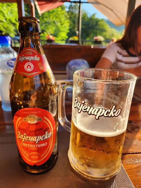 Guests enjoying Skadar Lake boat tours and Montenegrin food